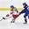 PLYMOUTH, MICHIGAN - April 3: Czech Republic's Tereza Vanisova #21 skates with the puck while Sweden's Fanny Rask #20 checks her during preliminary round action at the 2017 IIHF Ice Hockey Women's World Championship. (Photo by Minas Panagiotakis/HHOF-IIHF Images)